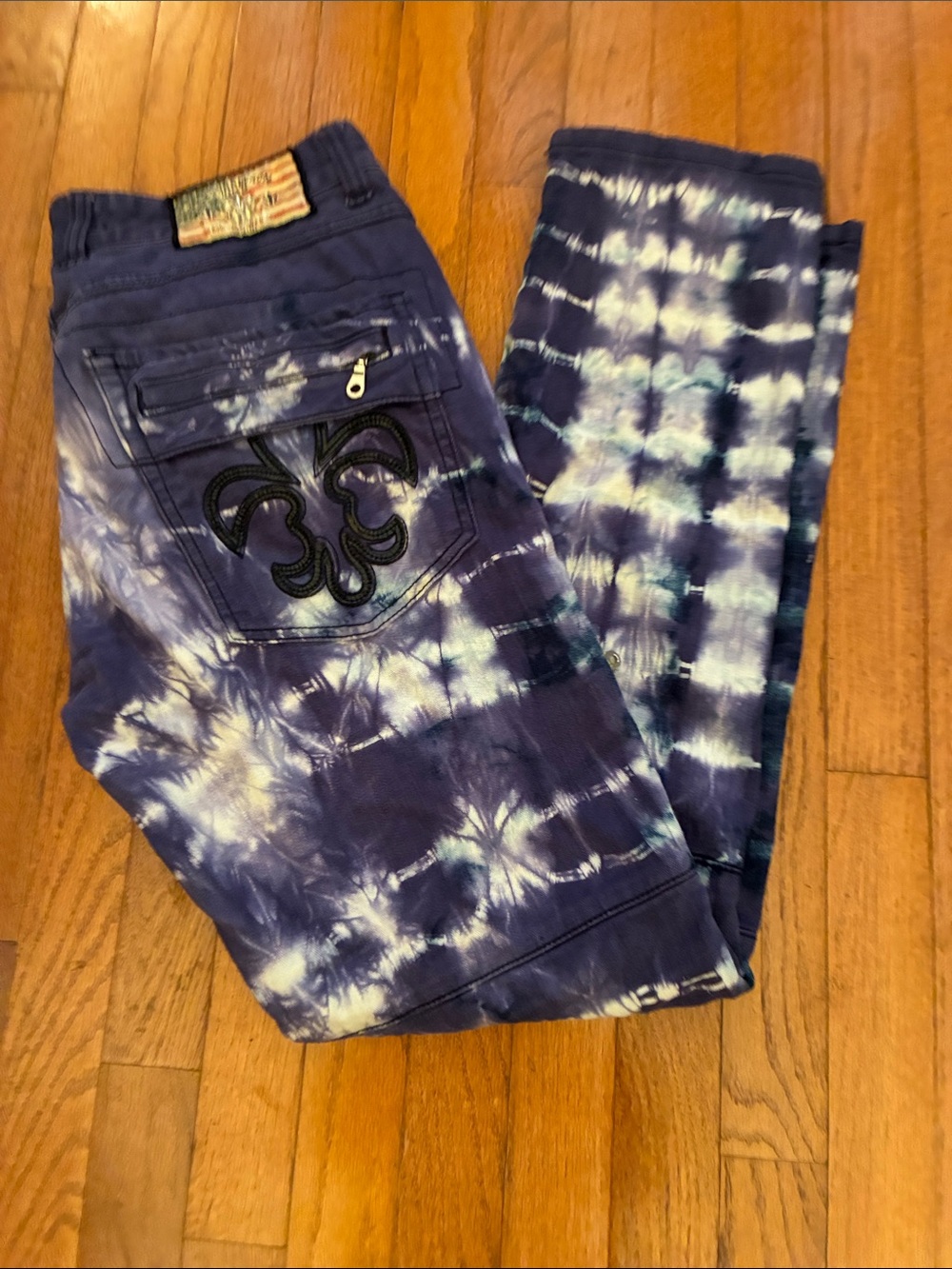 Laguna Beach Jean Co. Tie Dye with Embroidered Fleur De Lis and Zipper Pockets